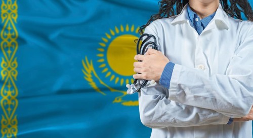 Healthcare professional with Kazakhstan flag background. Professional doctor holding stethoscope on