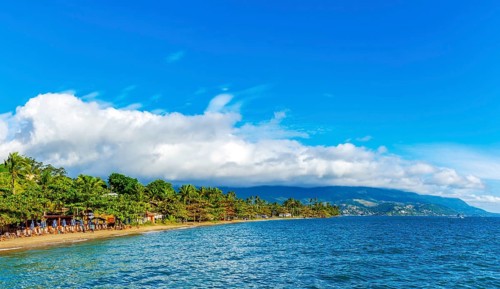 The urban coastline of Ilhabela meets the sea, forest, and mountains of São Paulo's coast,