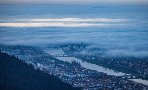 Aerial view of the city of Heidelberg on the Neckar, fog landscape of low-hanging clouds and fog