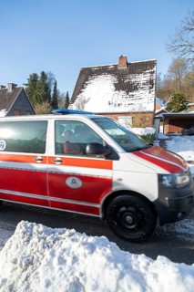 Snowy road, ambulance, houses, winter, snow, Sieversen, Samtgemeinde Rosengarten, Lower Saxony,