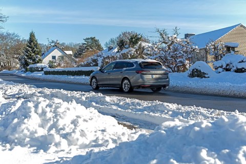 Snowy road, car, houses, winter, snow, Sieversen, Samtgemeinde Rosengarten, Lower Saxony, Germany