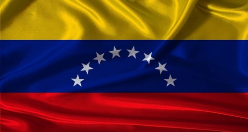 National flag of Venezuela with cloth texture. Venezuela flag with realistic texture background