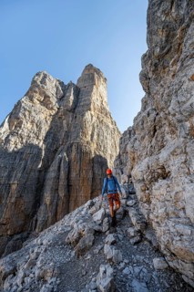 Climbers on the Via Ferrata Bocciere Centrale via ferrata, spectacular mountain landscape with