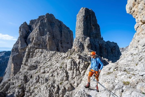 Climbers on the Via Ferrata Bocciere Centrale via ferrata, spectacular mountain landscape with