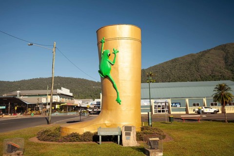 Famous giant boot monument and tourist landmark on a bright sunny day. Golden Gumboot, Tully,