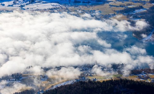 View of a sea of fog from Vormauerstein, Sankt Wolfgang am Wolfgangsee, church tower rising out of