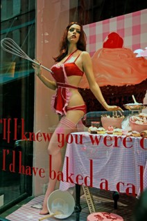 Lightly dressed mannequin of a pastry shop, New York City, USA