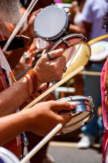 Tambourines and musicians during a carnival celebration in the streets of Brazil, Belo Horizonte,