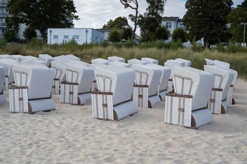 Beach chairs set up for transport to winter quarters, sandy beach, Baltic Sea, Binz, seaside