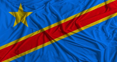 Democratic Republic of the Congo flag with fabric texture background. National flag of the