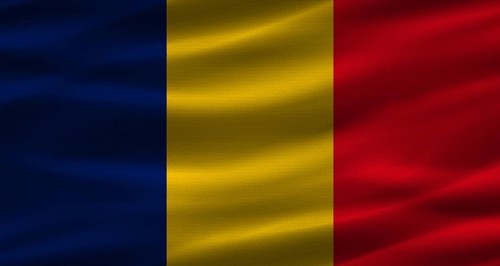 Chadian flag with fabric texture. Realistic flag of Chad waving