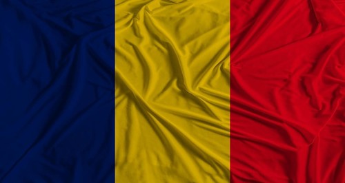 Chad flag with fabric texture background. National flag of Chad with cloth texture