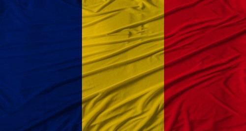 Chadian flag waving. Flag of Chad with cloth texture