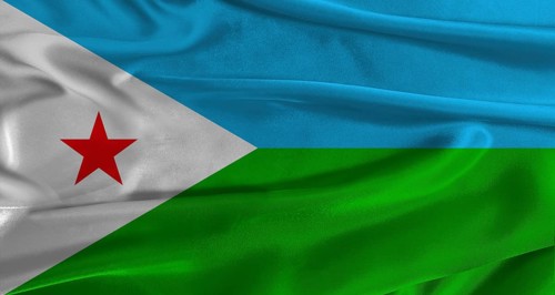 Flag of Djibouti with fabric textured background. Close up of National flag of Djibouti with