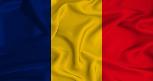 Realistic Chad flag waving. Close up of flag of Chad with cloth texture