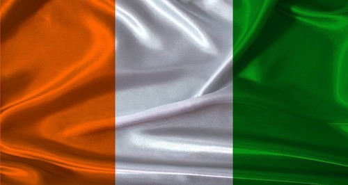 National flag of Ivory Coast with cloth texture. Ivory Coast flag with realistic texture background