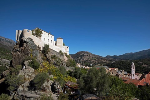 Citadel with the bastion Eagle's Nest, mountain town of Corte, on the right the village of Corte,