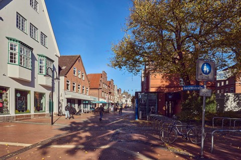 Pedestrian zone, houses, residential buildings and commercial buildings, brick houses, façade with