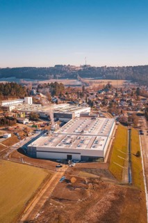 Industrial complex and village surrounded by forests and hills, Glatten, Freudenstadt district,