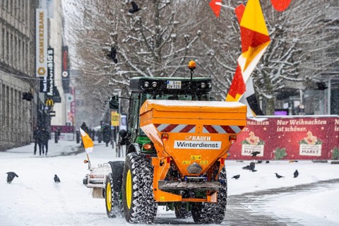 Winter in Stuttgart. There is a closed blanket of snow in the city center. Winter cleaning service