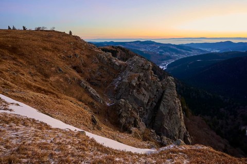 Rocky hill at sunset with a wide view, looking towards the Rhine Valley, viewpoint, La Gorge de