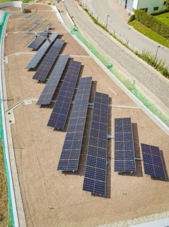 Aerial view of structured solar modules on a gravel roof, new Park and Ride Calw Heumaden car park