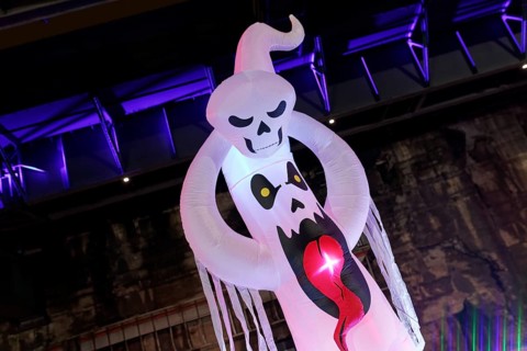 Illuminated ghost figure at Halloween Run, night run in the Dusiburg-Nord Landscape Park, Duisburg,