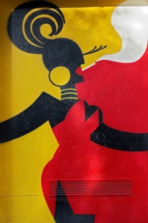 Stylized female figure, colored mural by street art artist Mina Mania, Cubus Kunsthalle,