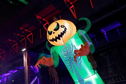 Illuminated scary figure at Halloween Run, night run in the Duisburg-Nord Landscape Park, Duisburg,