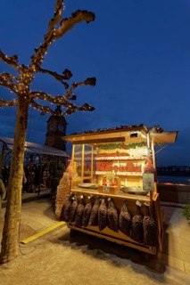 Illuminated chestnut stand at the Christmas market, roasted chestnuts, Düsseldorf Old Town,
