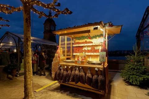 Illuminated chestnut stand at the Christmas market, roasted chestnuts, Düsseldorf Old Town,
