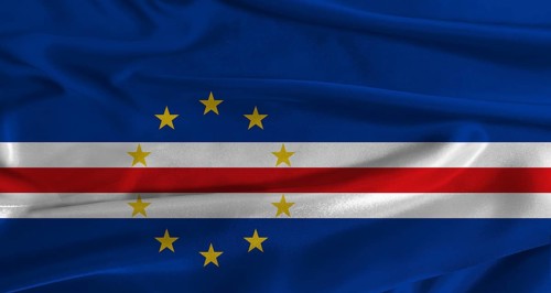 Flag of Cape Verde with fabric textured background. Close up of National flag of Cape Verde with