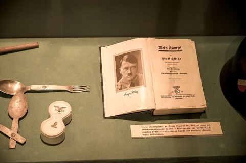Book Mein Kampf with portrait and signature of Hitler in a museum exhibition at the Kiberg Partisan