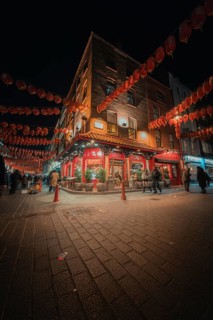 Illuminated street in China Town at night with red lanterns, China Town London, England, Great
