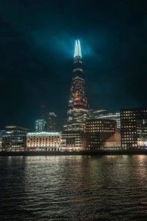 The illuminated Shard skyscraper at night in London, London, England, Great Britain
