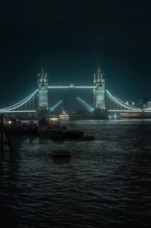 Illuminated Tower Bridge over the river at night, London, England, Great Britain