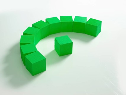 10 green wooden cubes against a white background