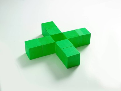 8 green wooden cubes against a white background