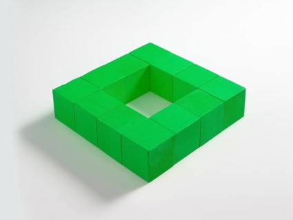 12 green wooden cubes against a white background