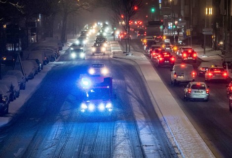 Ambulance, RTW, the Essen professional fire brigade during an emergency trip with flashing lights,
