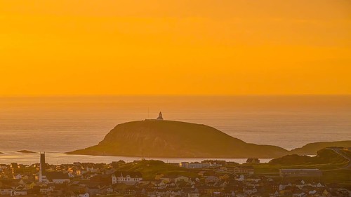 View of the city of Vardø from Mount Domen in the background the island of Hornoya with the