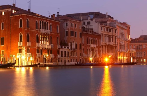 Gondolas and palaces on the Grand Canal, Venice, Veneto, Italy