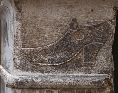 Reference to the former school of shoemakers, this school only taught how to make shoes, not
