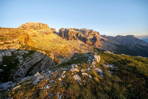 View of rocky mountain peaks of the Brenta Mountains at sunset, Alpenglühen, mountain landscape on
