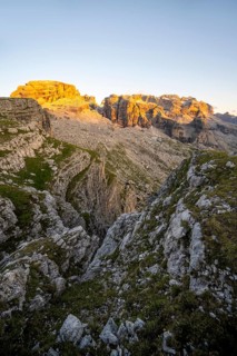 View of rocky mountain peaks of the Brenta Mountains at sunset, Alpenglühen, mountain landscape on
