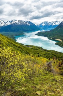View of snowy mountains and turquoise lake Kenai Lake, Slaughter Ridge Trail, Cooper Landing, Kenai