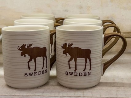 Swedish souvenir: mugs with moose picture in Småland Moose park in Markaryd, Småland County,