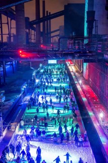 Ice rink at the Zollverein coking plant, ice skating with music and many lighting effects, Essen,