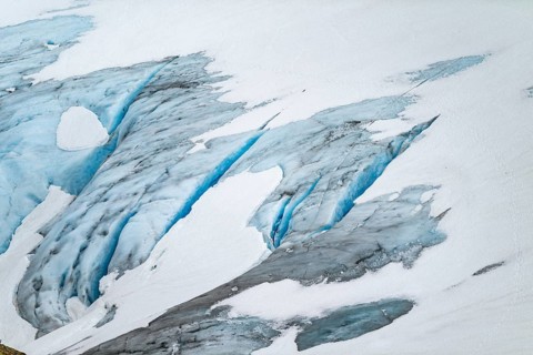 Blue rugged glacier ice with crevasses and snow, detail, Exit Glacier, Kenai Peninsula, Alaska, USA
