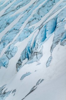 Blue rugged glacier ice with crevasses and snow, detail, Exit Glacier, Kenai Peninsula, Alaska, USA